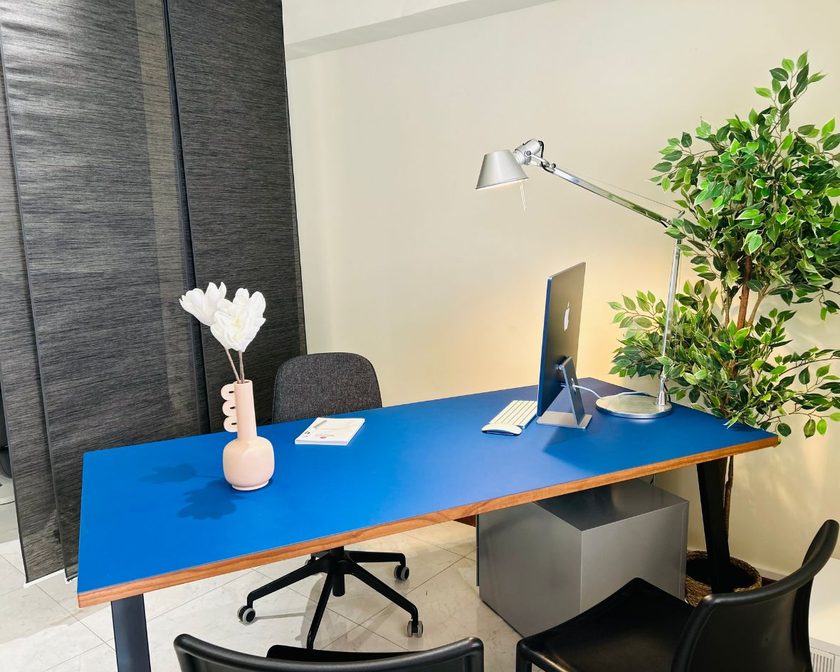 Consulting office with a blue desktop